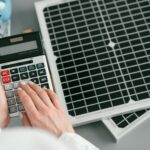 close-up-hand-typing-calculator (1)